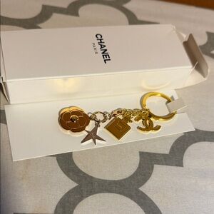 CHANEL Gold-Tone Camellia & CC Charm Key Holder